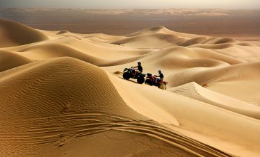 Experience thrilling quad biking across Merzouga's stunning desert dunes.